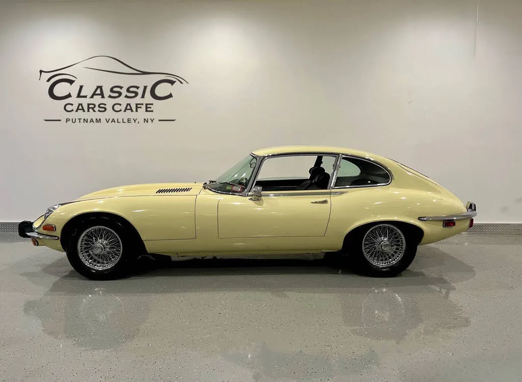 1973 Jaguar E-Type Coupe in bright yellow, ready for a new owner