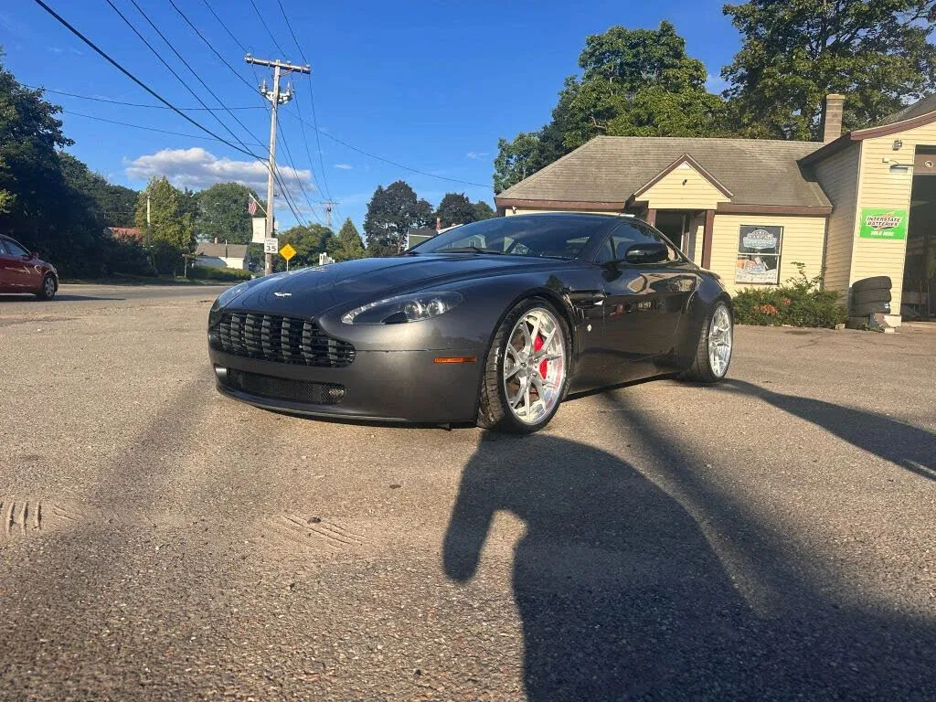 2007 Aston Martin V8 Vantage Coupe in gray, a prime example of an affordable luxury sports car