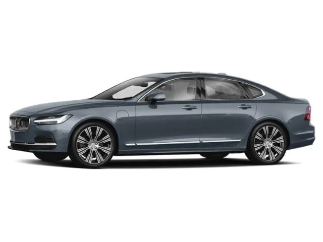 2022 Volvo S90 Recharge Plug-in Hybrid luxury sedan in white, showcasing its commanding presence and elegant lines.