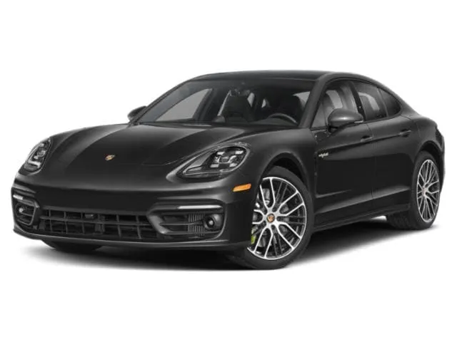2023 Porsche Panamera Turbo S E-Hybrid in white, showcasing its sleek profile and luxurious sporty appeal.