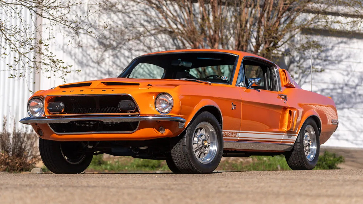 A 1968 Shelby GT500KR Fastback in Special Light Orange.