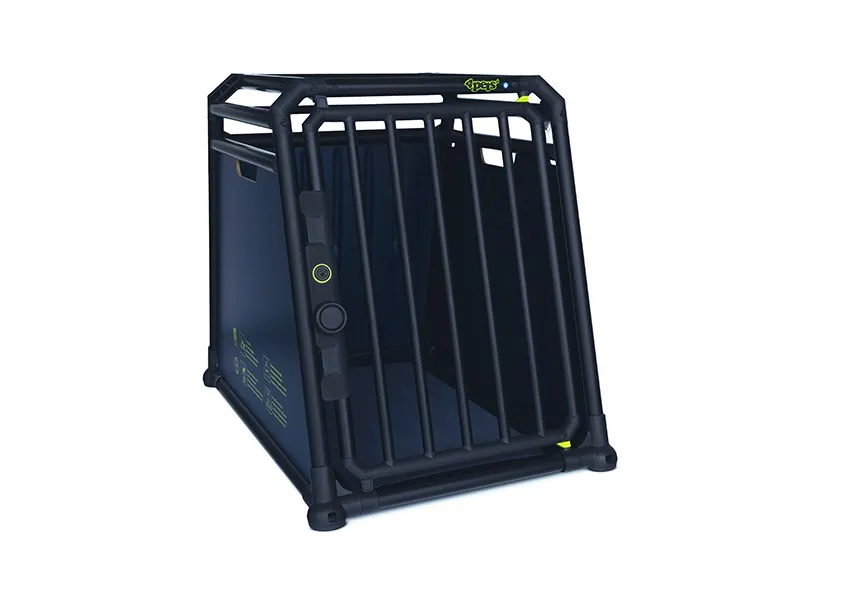 A black 4pets PRO dog cage installed in the boot of a car.