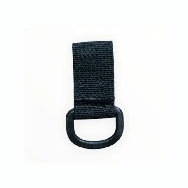 A black dog walking utility belt with various accessories attached, showcasing its practical design for outdoor activities with dogs.