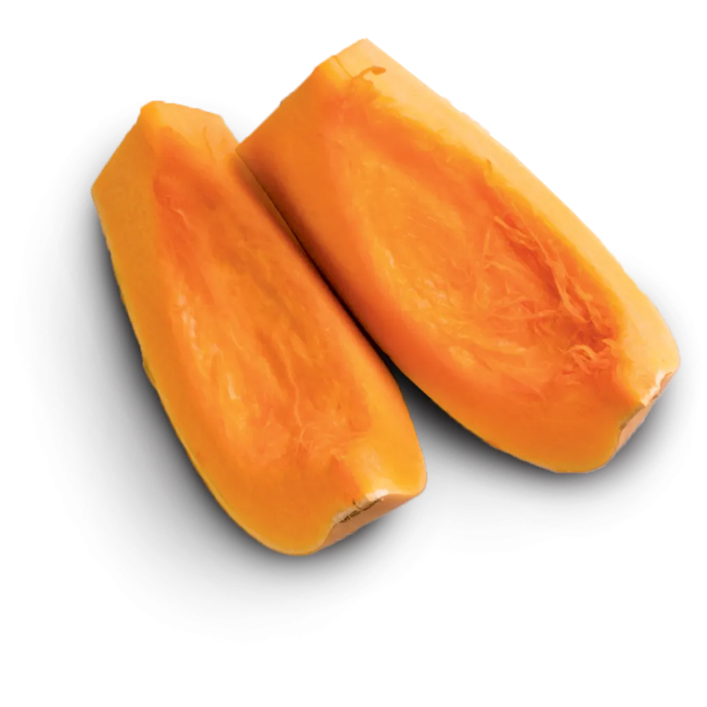 A close-up of cooked pumpkin pieces, showcasing its vibrant orange color and slightly lumpy texture.