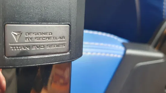 A close-up of the Warhammer 40k gaming chair, showcasing the Titan Evo logo and the chair's high-quality materials.