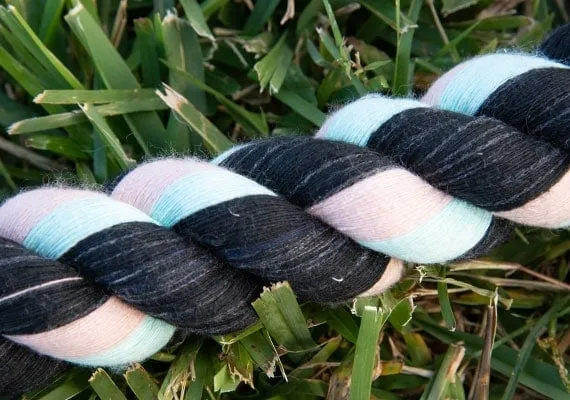 A close-up view of the tightly twisted cotton strands forming a dog rope toy, showcasing its construction.