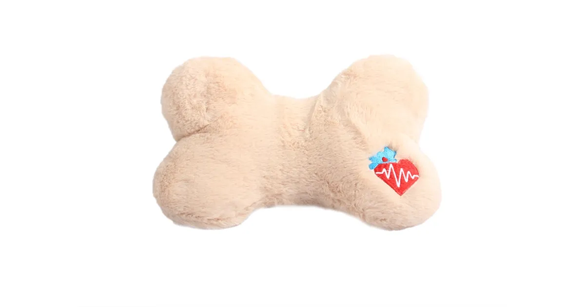 A comfortable pillow-style teddy with a simulated heartbeat, offering a secure sleeping spot for puppies.
