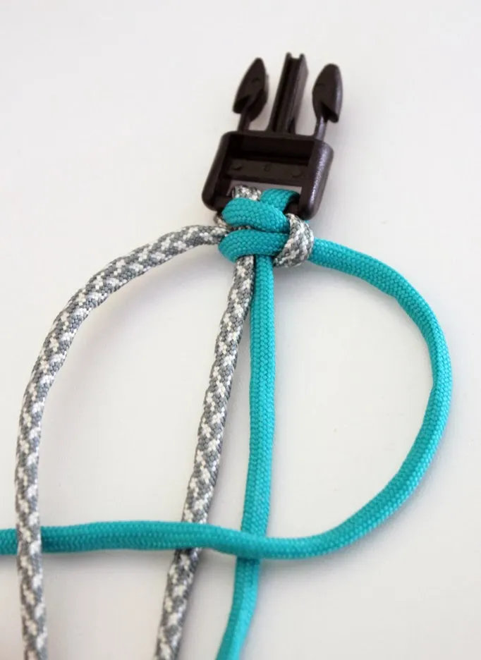 A diagram illustrating the creation of a "p" shape and the placement of the left cord over the right.