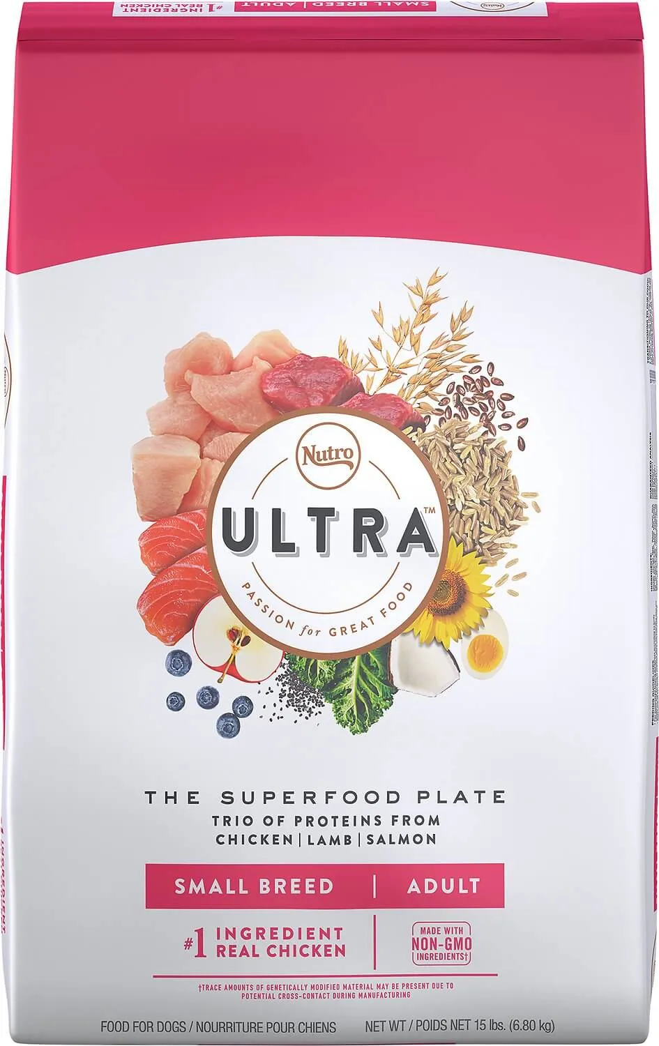 A happy puppy looking at a bowl of Nutro Ultra puppy food