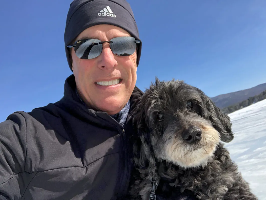 A Labradoodle named Cynder and Craig, celebrating her 13th birthday.