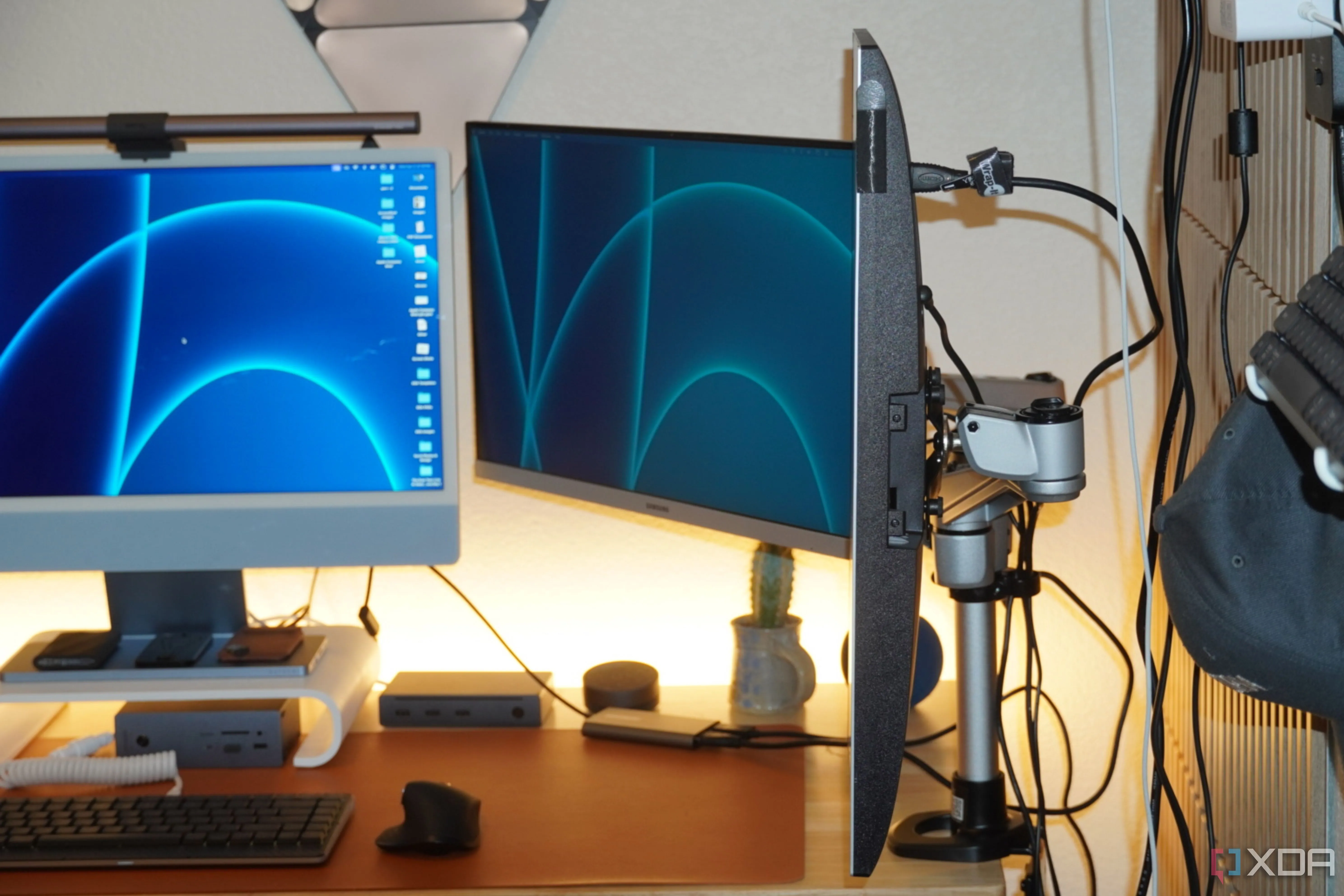 A multi-monitor arm setup, illustrating the need for multiple display outputs