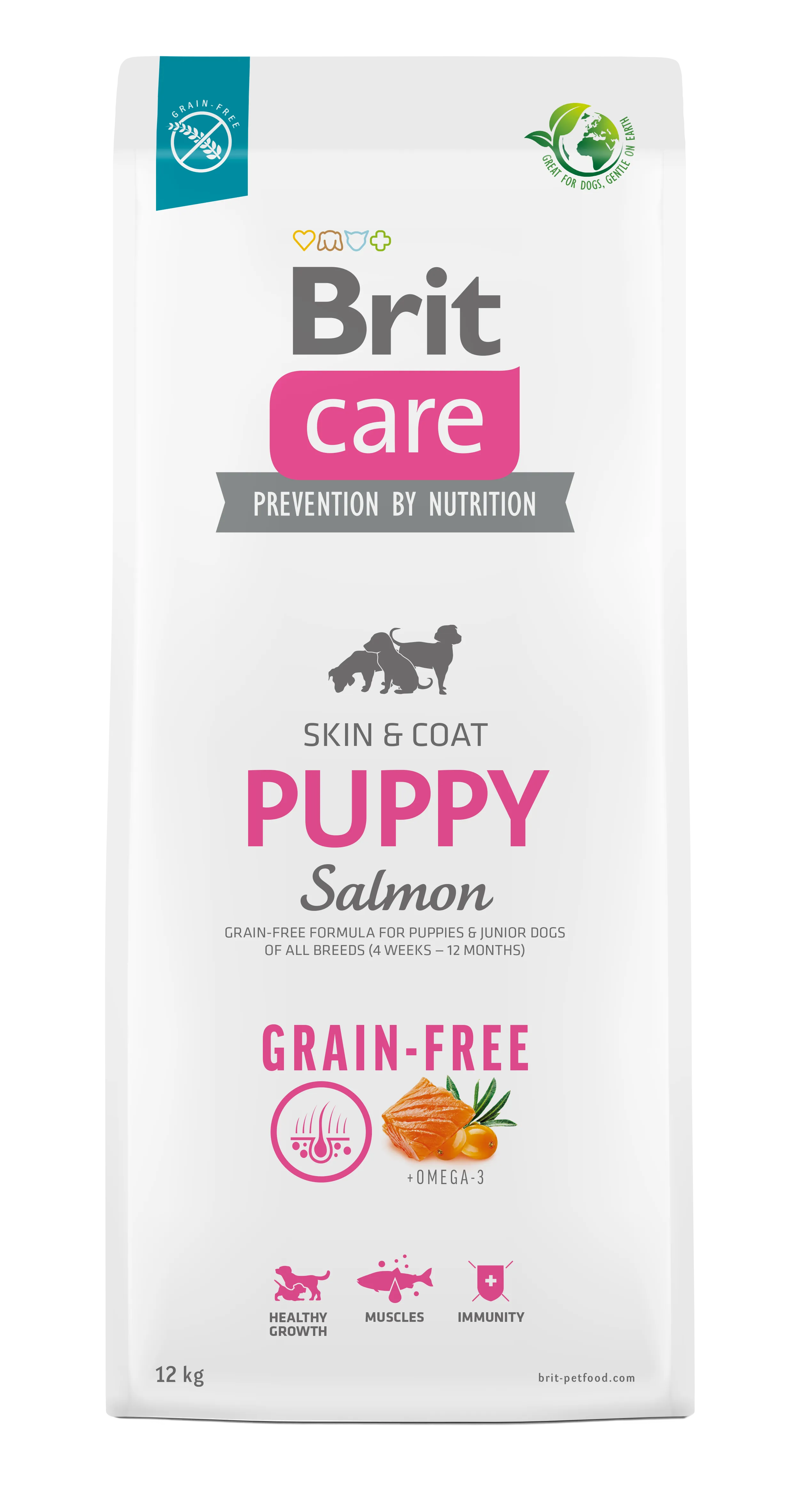 A puppy with a healthy, shiny coat happily eating from a bowl of Brit Care puppy food.
