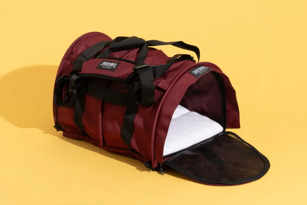 A SturdiBag Pro 3.0 flexible travel carrier, an essential item on a new dog owner shopping list for safe car and air travel.