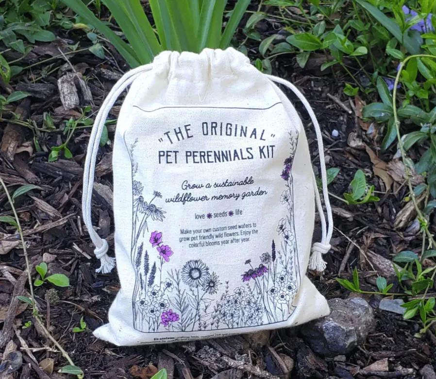 A wildflower garden kit designed for memorializing a pet, potentially incorporating cremated remains.