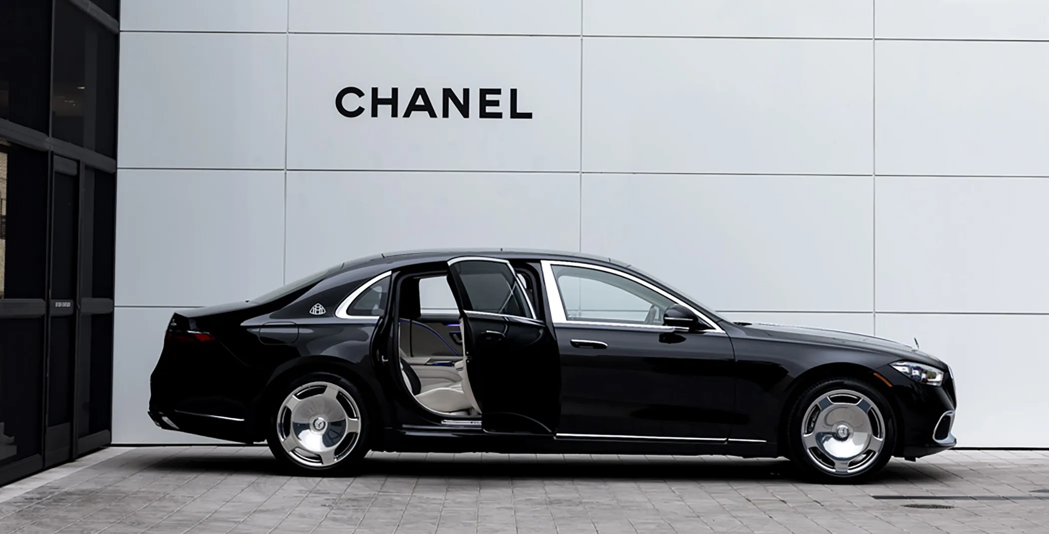 An array of exotic car models available for rental, including a Lamborghini and a Rolls-Royce