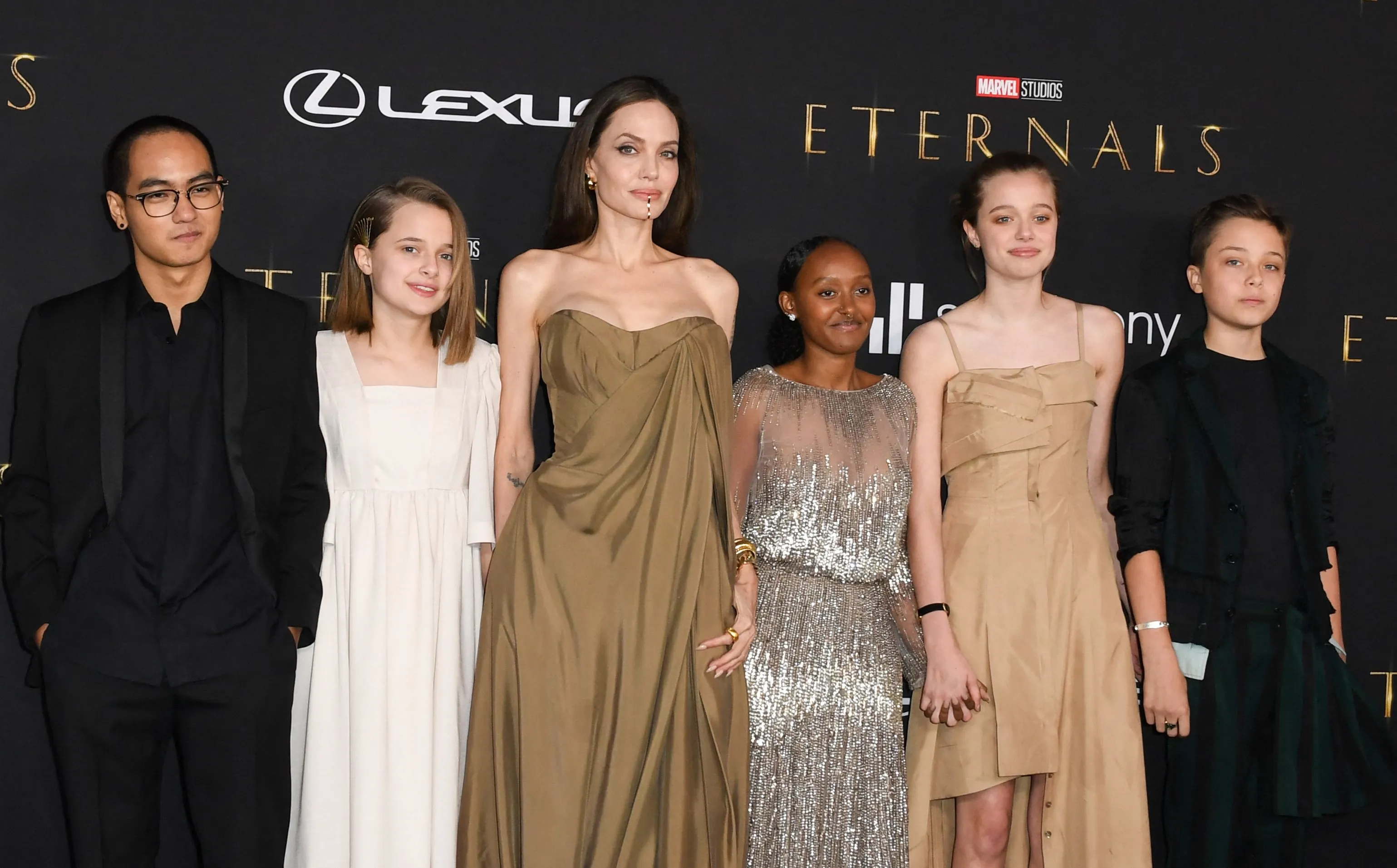 Angelina Jolie with her children, including Shiloh.
