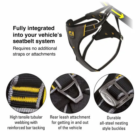 Another view of a dog wearing the Impact Harness, looking forward comfortably in a car seat.
