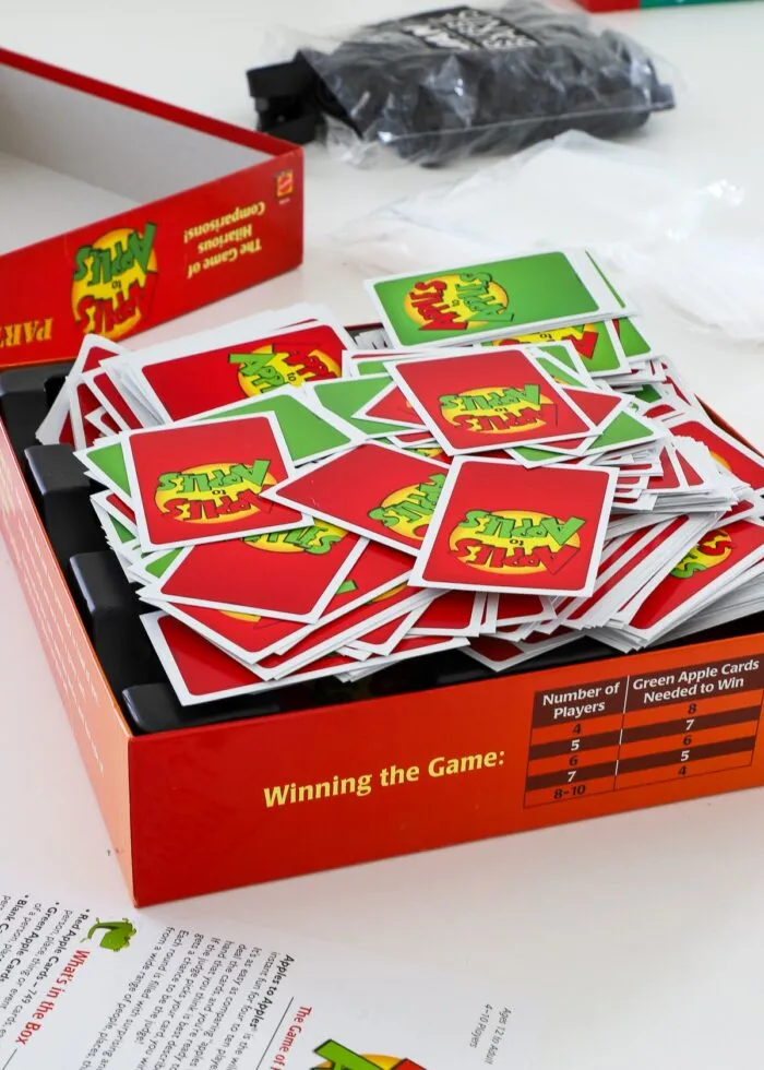 Apples to Apples card game in a mess