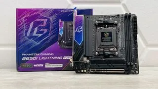 ASRock Phantom Gaming B850I Lightning Wi-Fi motherboard on a desk.