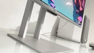 Asus ProArt PA32UCDM monitor showing its adjustable stand and the elegant integration into a professional setup