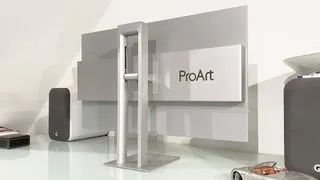 Asus ProArt PA32UCDM monitor with a close-up on the base and branding, emphasizing its premium feel