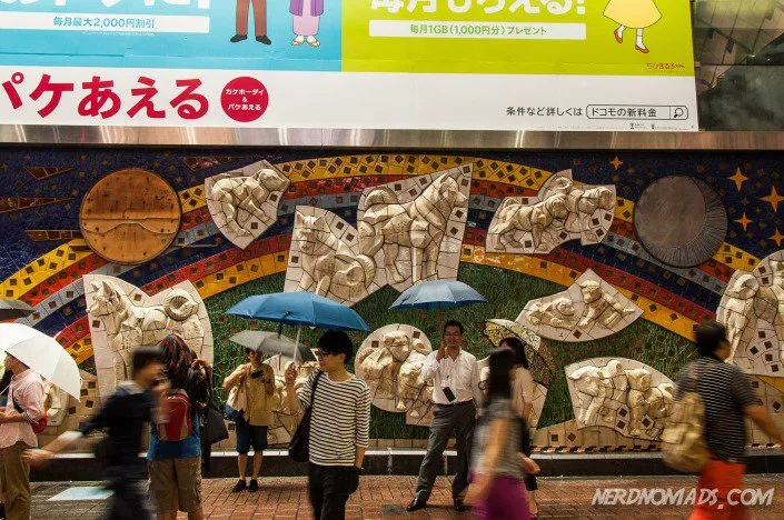 Beautiful mosaic mural titled "Hachiko Family" at Shibuya Station, Tokyo, showing Hachiko with his family