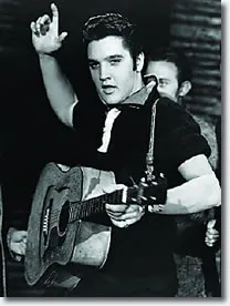 Black and white image of Elvis Presley on the Ed Sullivan Show, 1956