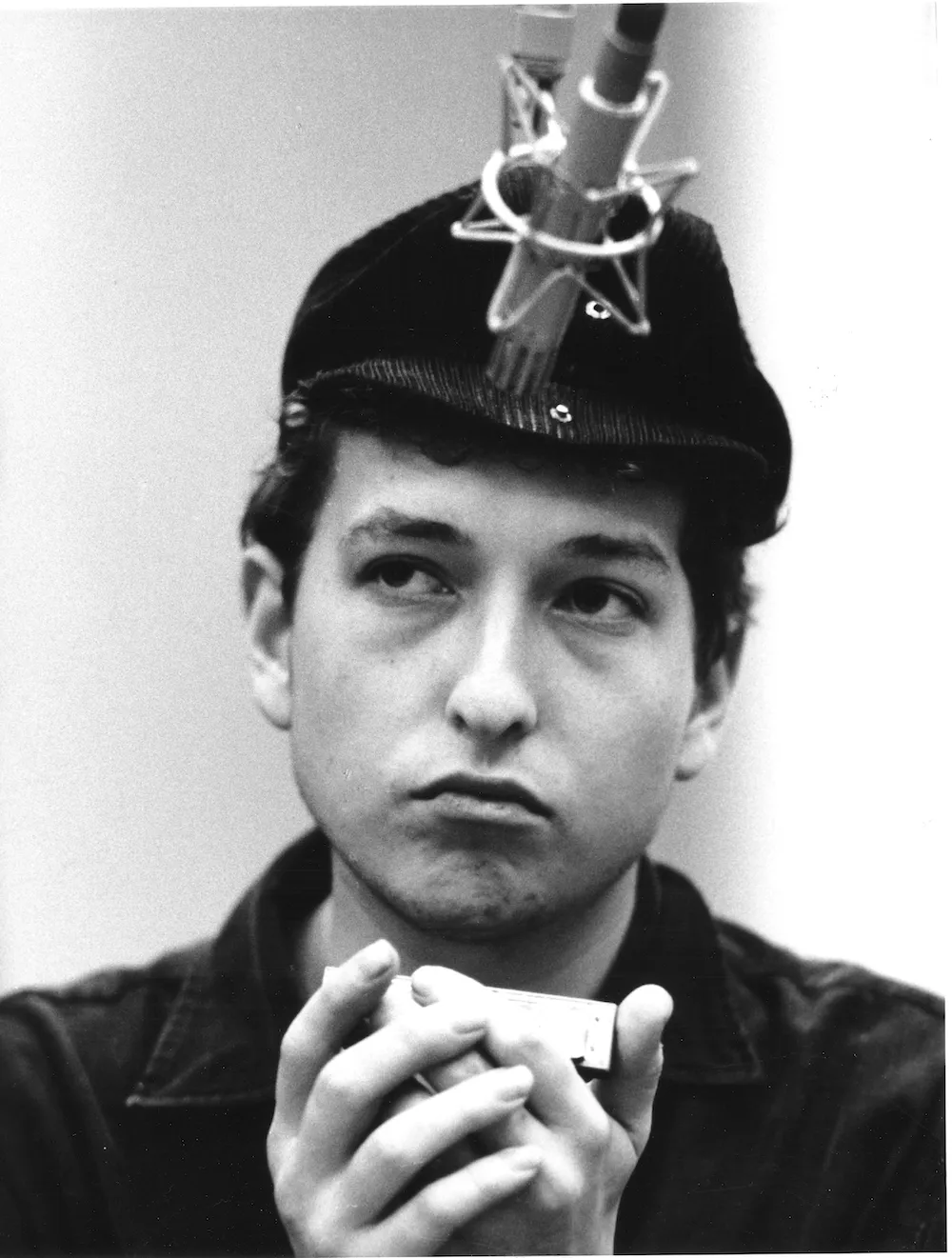 Bob Dylan playing harmonica in Columbia Recording Studio