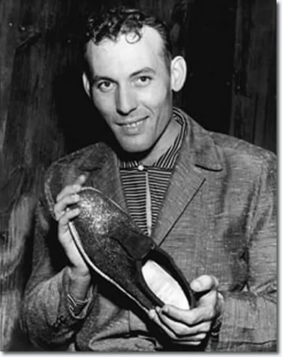 Carl Perkins in 1956, the year "Blue Suede Shoes" became a major hit