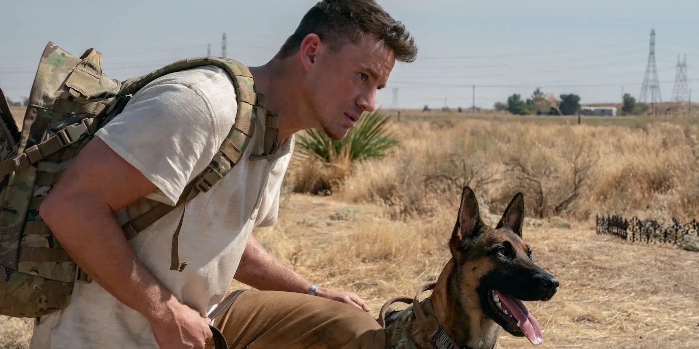 Channing Tatum as Jackson Briggs and Lulu the Belgian Malinois looking intently in a scene from Dog