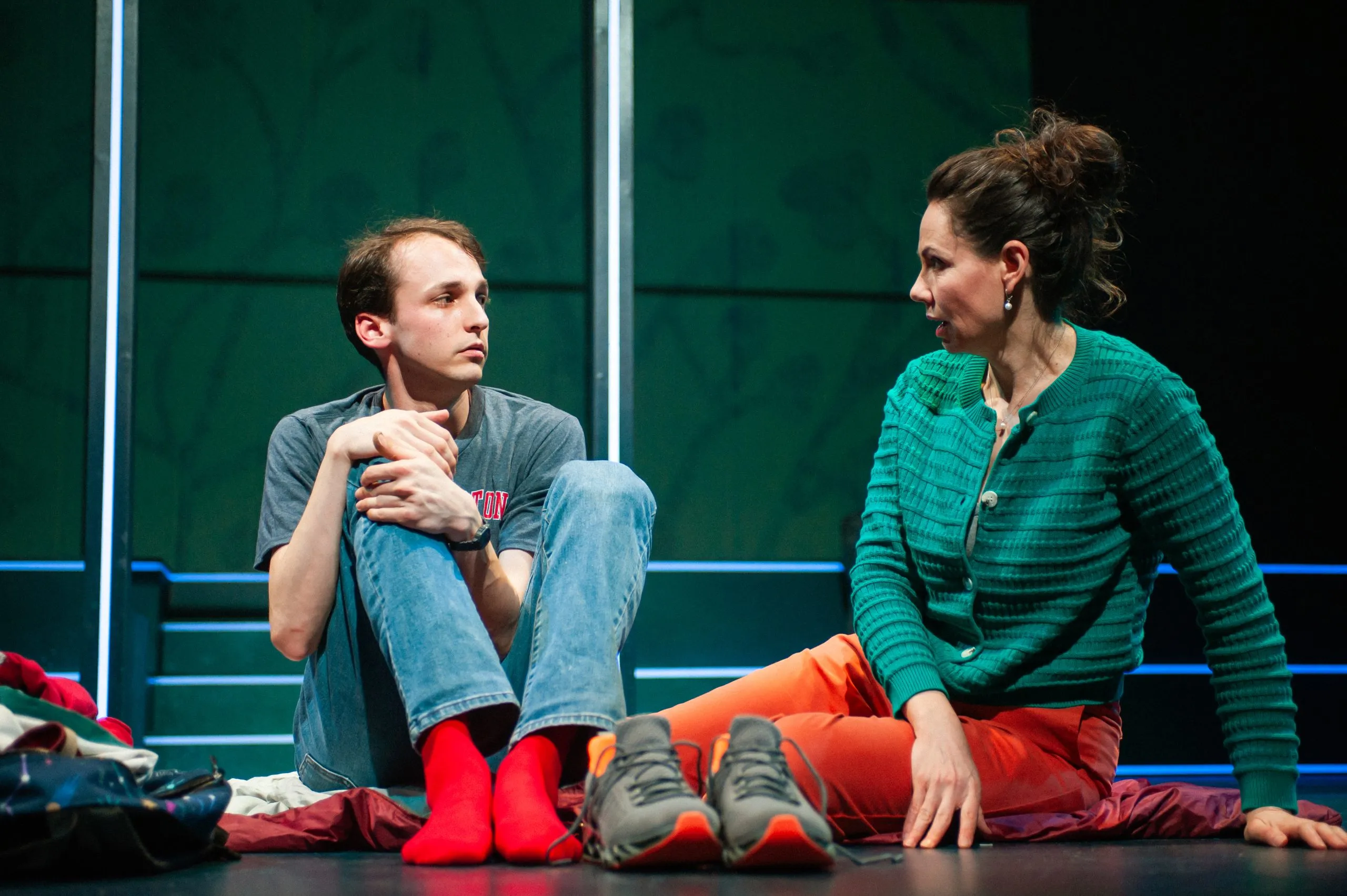 Christopher (Brendan Looney) listens to his mother Judy (Liz Sklar)