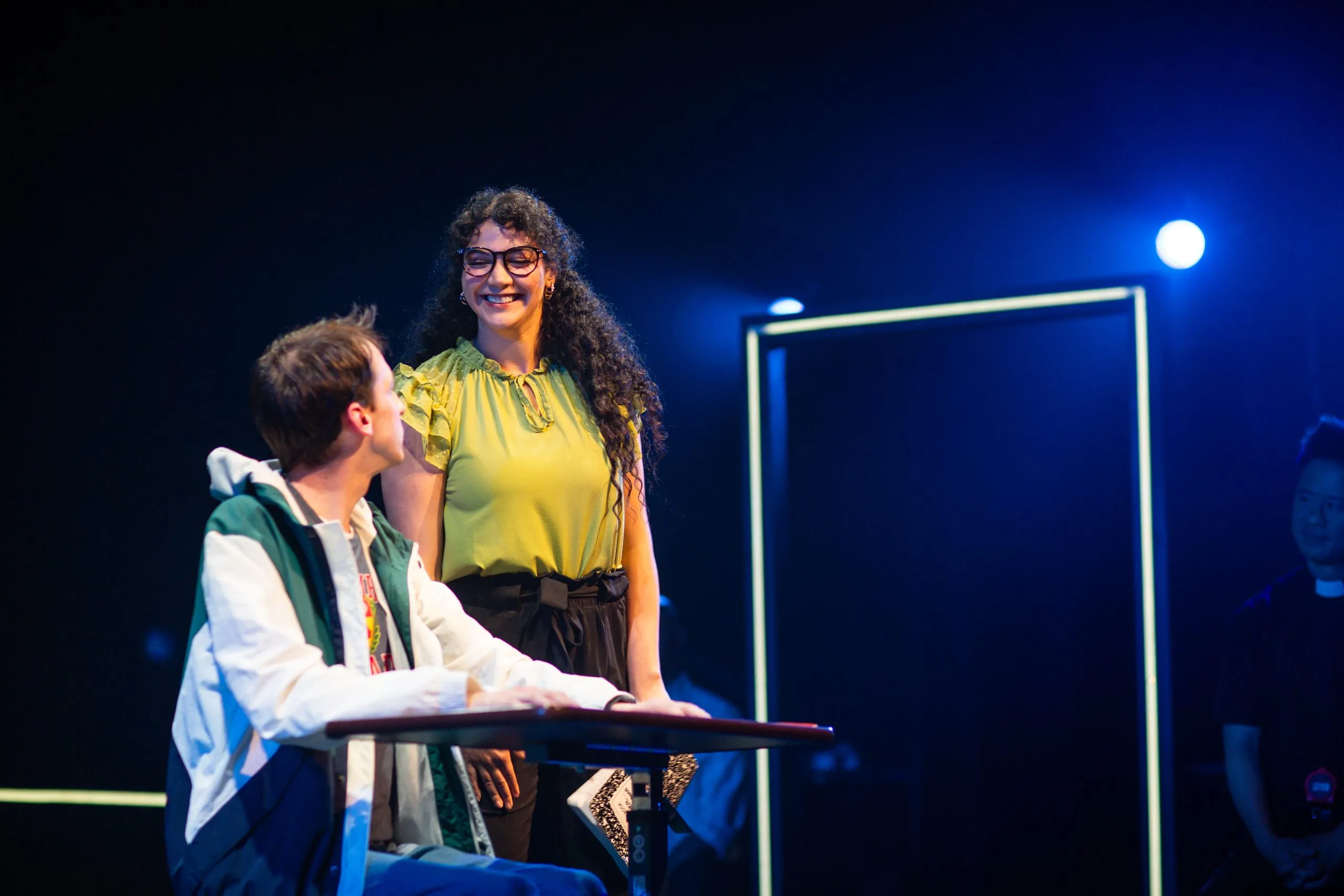 Christopher (Brendan Looney) listens to his teacher Siobhan (Sophia Alawi)