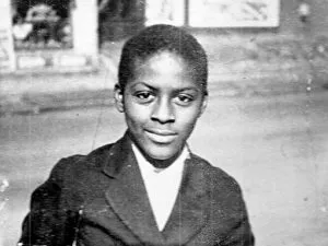 Chuck Berry smiling, a pioneer of rock and roll