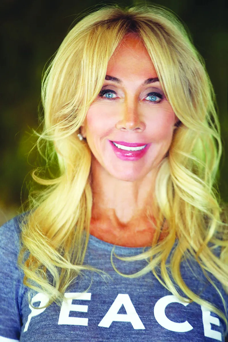 Cindy Landon scuba diving, showcasing her passion for ocean life