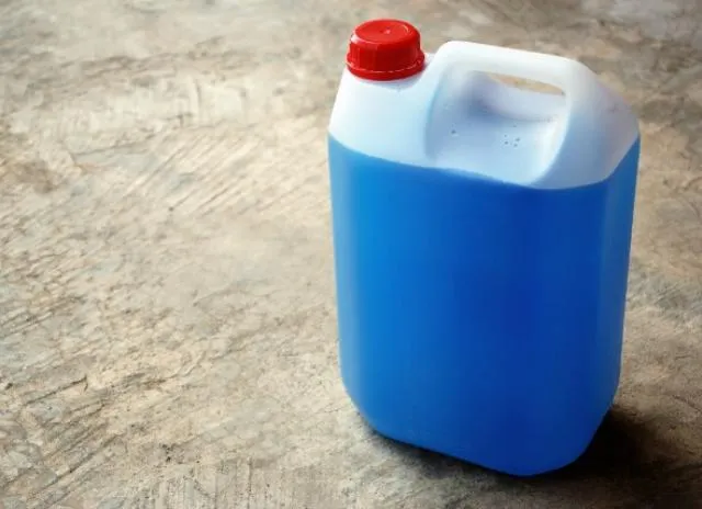 Close-up of antifreeze, a highly toxic substance to dogs.