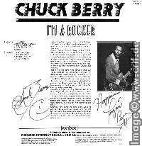 Close-up of Chuck Berry's autograph on a record, a testament to his enduring legacy