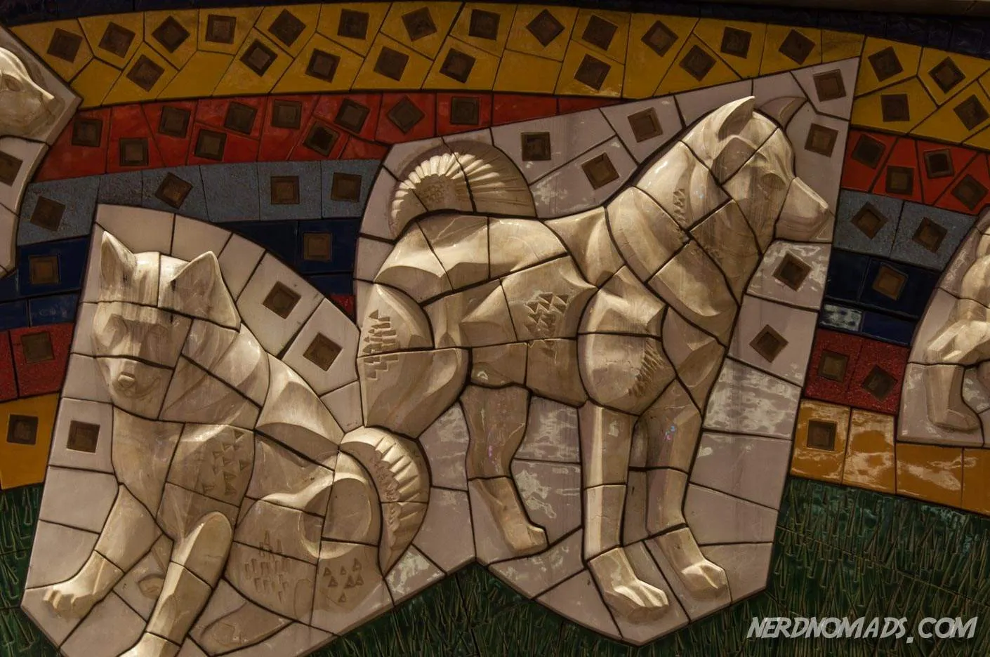Detailed close-up view of the Hachiko mosaic at Shibuya Station, revealing the intricate depiction of the beloved Akita