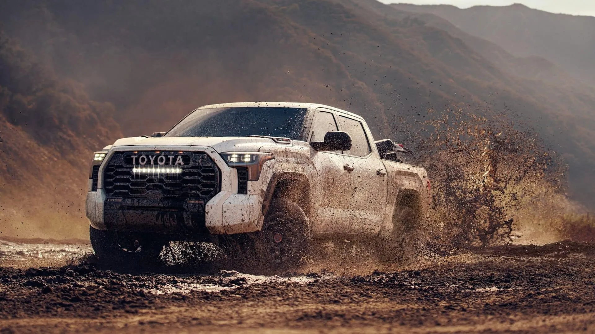 Detailed view of the i-FORCE MAX tundra hybrid motor in the 2024 Toyota Tundra, emphasizing its twin-turbo V6 power plant.