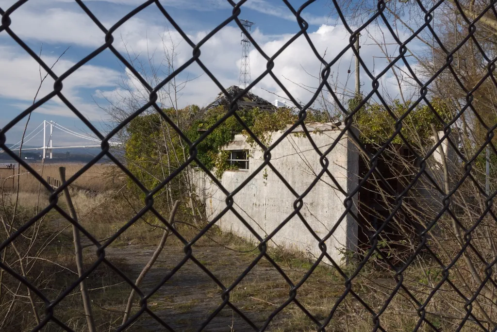 Disused ferry terminal and in the distance the first Severn motorway crossing.