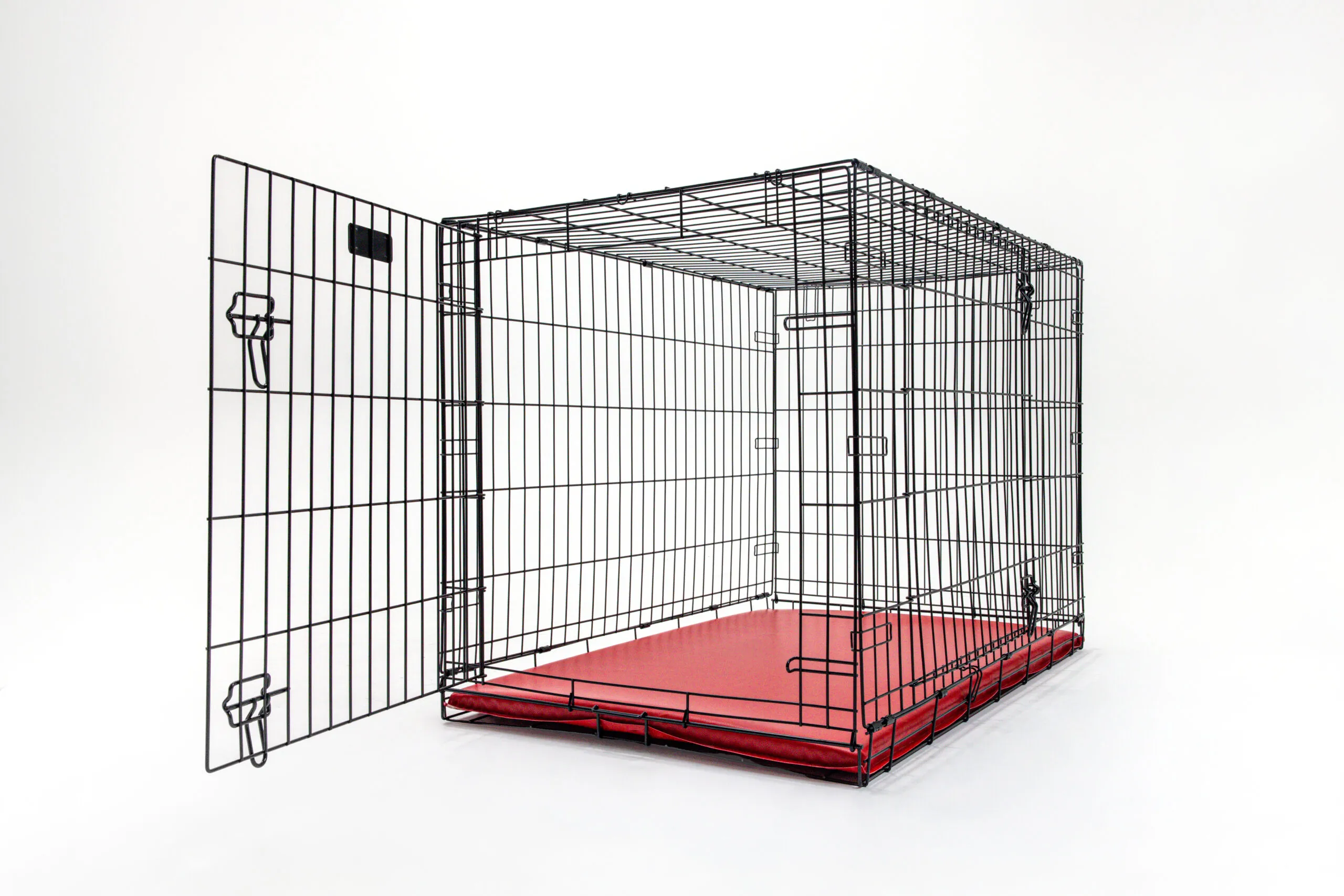 Dog lying on a comfortable crate pad