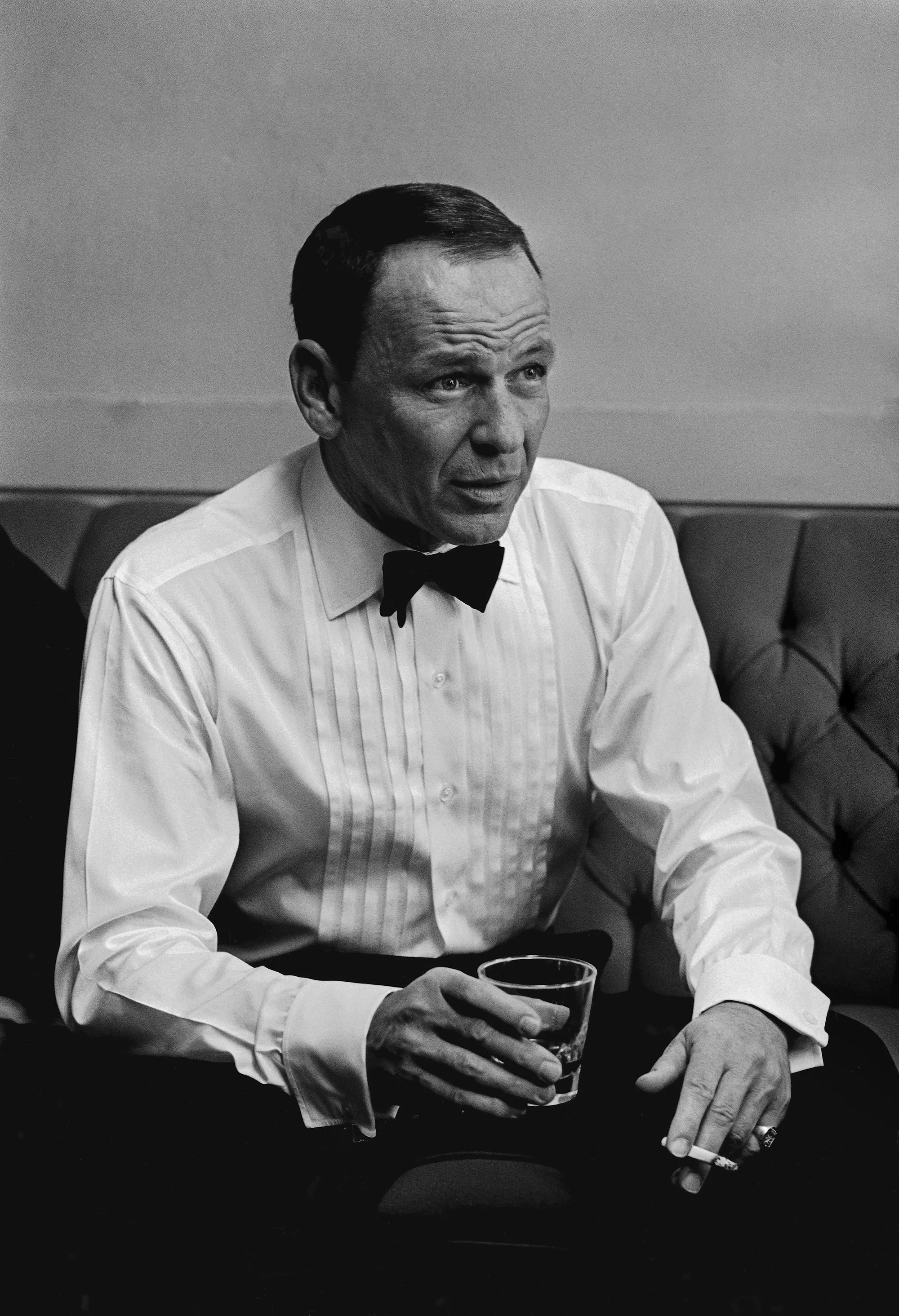 Dress shirt, Collar, Shirt, Hand, Sitting, Monochrome, Drink, Monochrome photography, Black-and-white, White-collar worker,