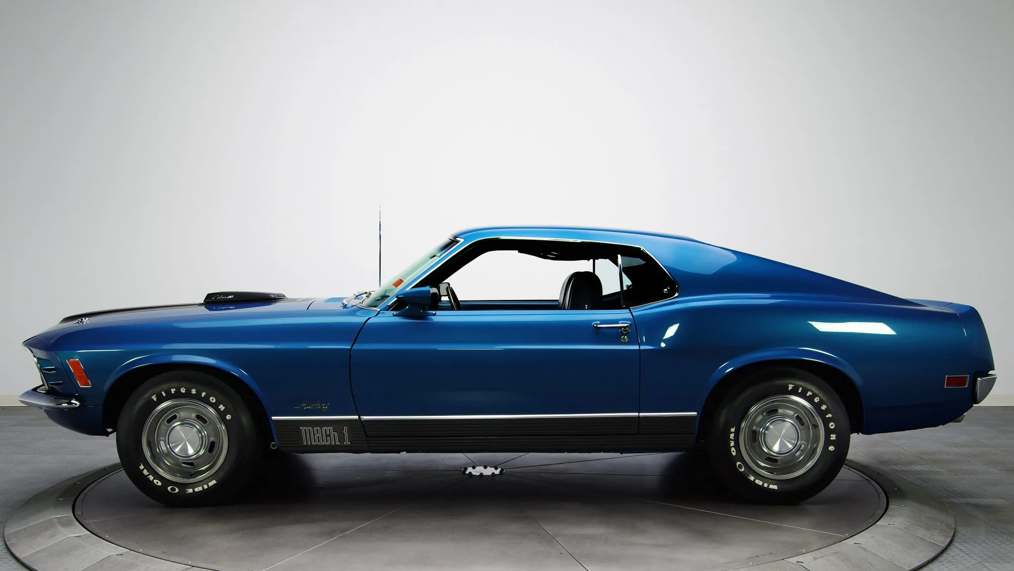 Dynamic shot of the 1970 Ford Mustang Mach 1 428 Super Cobra Jet, a performance icon.