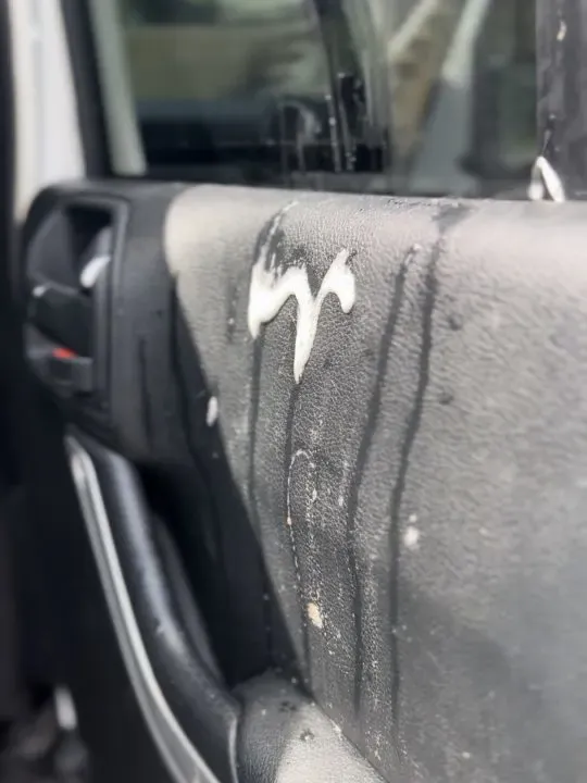 easy ways to protect car doors from dog scratches and drool