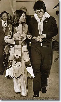 Elvis Presley and Priscilla Presley leaving the courthouse after their divorce hearing in 1973