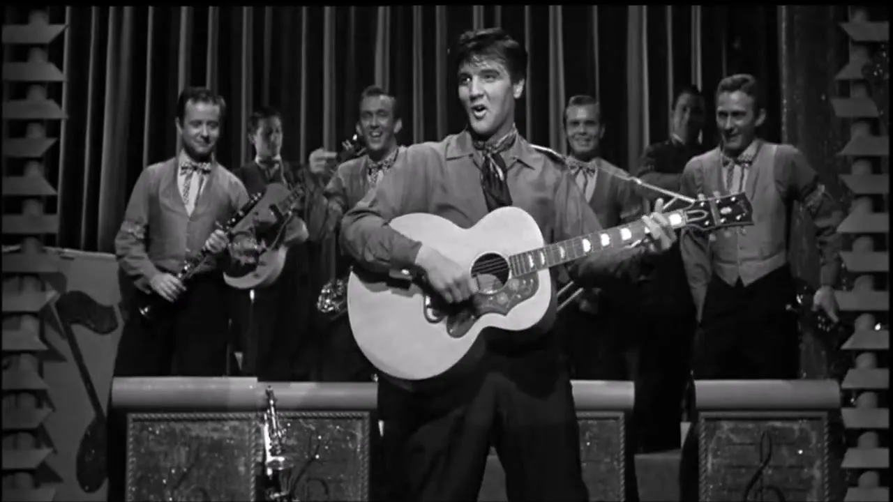 Elvis Presley as Danny Fisher in a candid King Creole film still, portraying his rebellious and thoughtful character