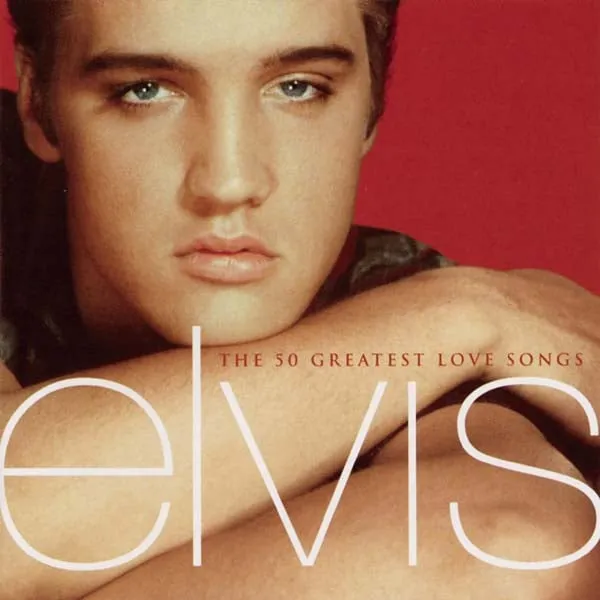 Elvis Presley performing a ballad, showcasing his emotive stage presence.