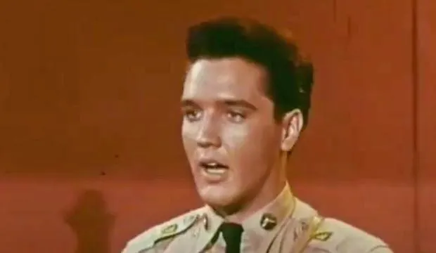 Elvis Presley performing Blue Suede Shoes