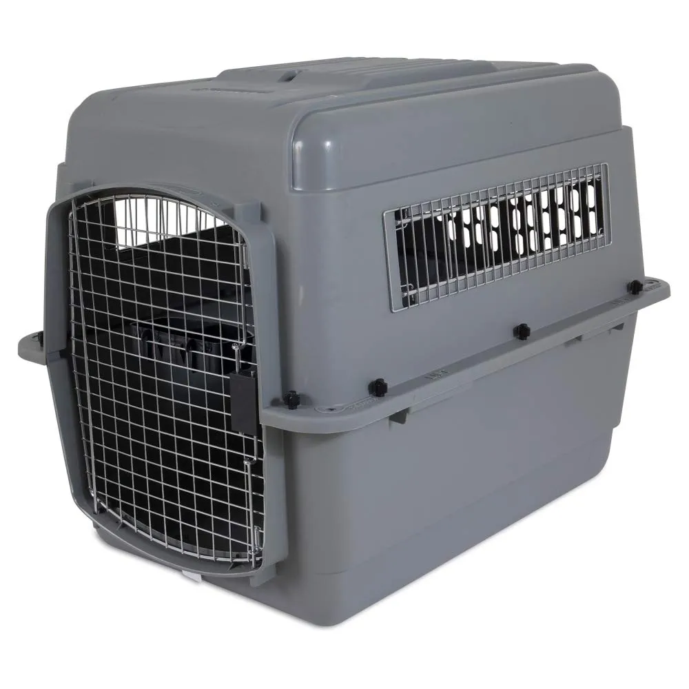 Enclosed beige plastic dog crate with ventilation holes, perfect for puppies needing a cozy, private den for crate training