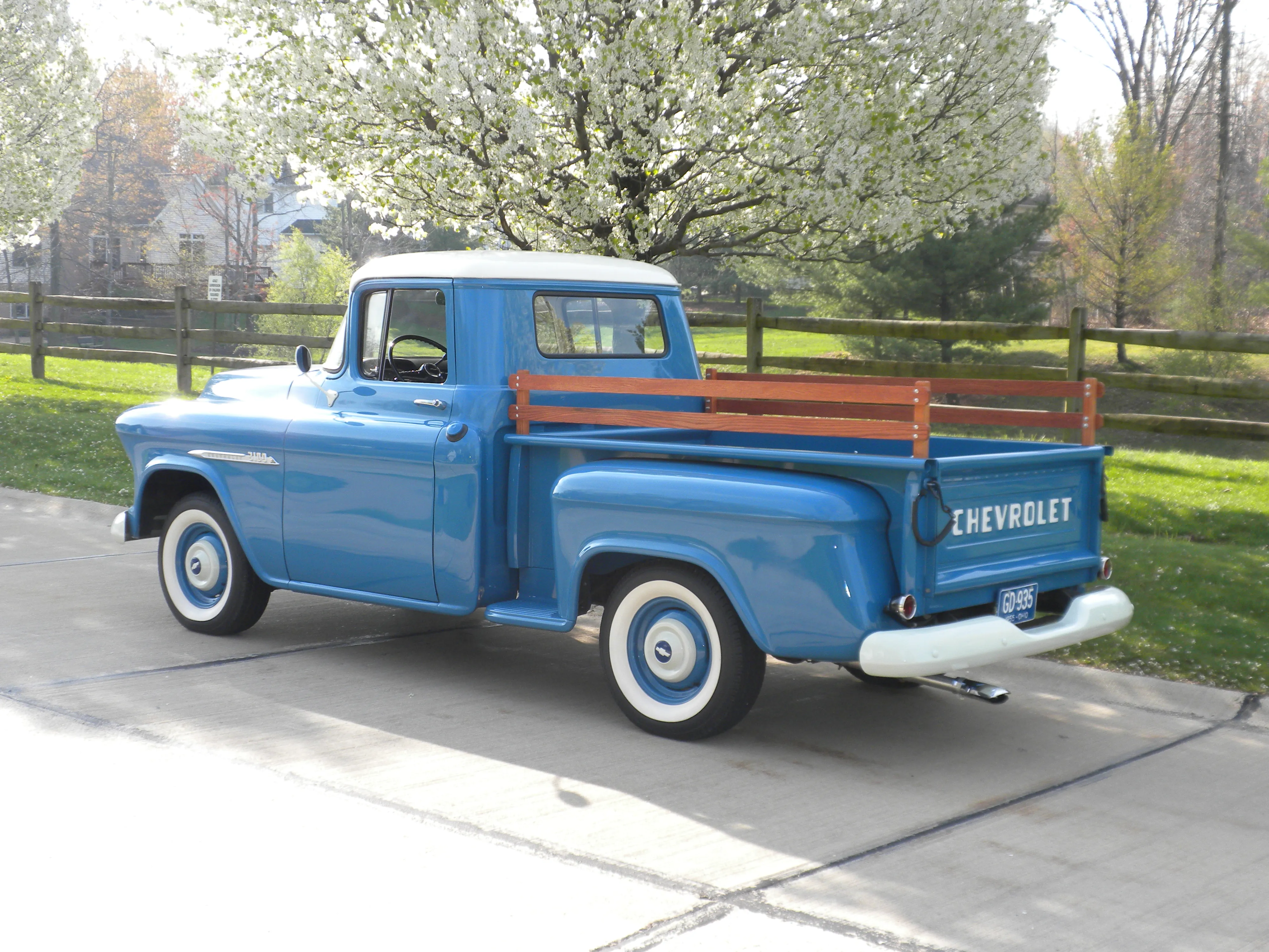 Engine bay of the 1955 Chevy 3100, showcasing the 235 cubic inch Thriftmaster six-cylinder engine.