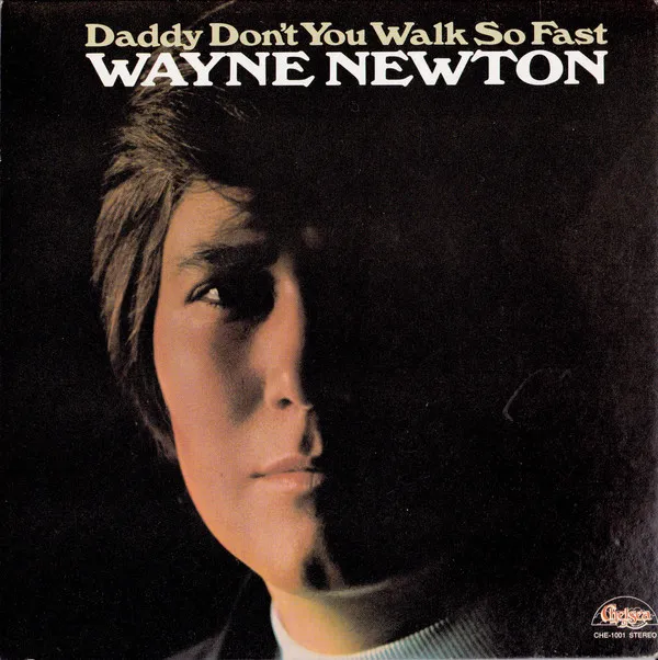 Father and child holding hands, symbolizing the poignant themes of Wayne Newton's "Daddy Don't You Walk So Fast" album, reflecting themes reminiscent of the Elvis Presley era's emotional depth.